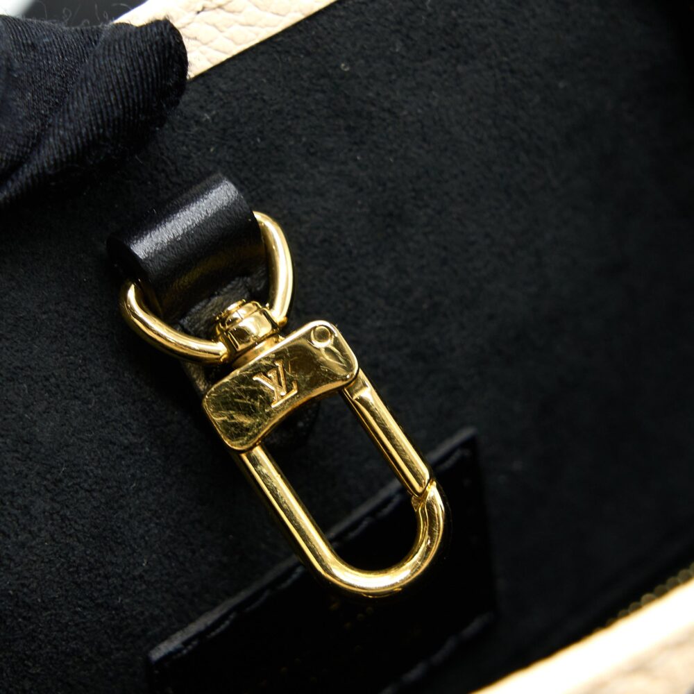AAA Replica Louis Vuitton LV ONTHEGO MM EMPREINTE CREAM/ BLACK GHW (NEW VERSION)