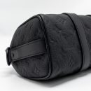 AAA Replica Louis Vuitton LV KEEPALL BANDOULIERE 25 MONOGRAM TAURILLON LEATHER BLACK WITH BLACK HARDWARE