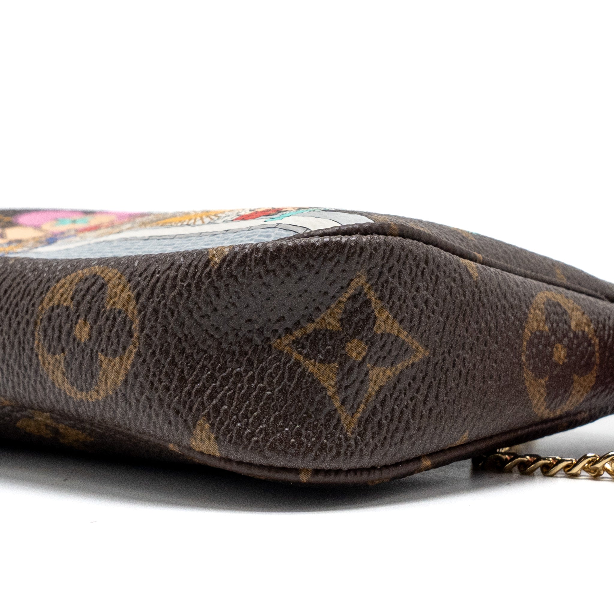 AAA Replica Louis Vuitton LV MINI POCHETTE HOLIDAY LIMITED PRINT MONOGRAM CANVAS GHW