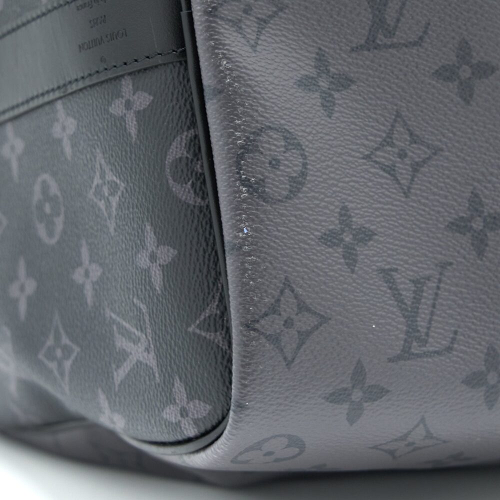AAA Replica Louis Vuitton LV KEEPALL BANDOULIERE 50 MONOGRAM ECLIPSE CANVAS BLACK/GREY BLACK HARDWARE (NEW VERSION)