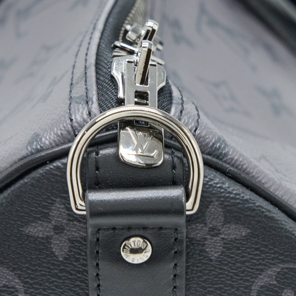 AAA Replica Louis Vuitton LV KEEPALL BANDOULIERE 50 MONOGRAM ECLIPSE CANVAS BLACK/GREY BLACK HARDWARE (NEW VERSION)