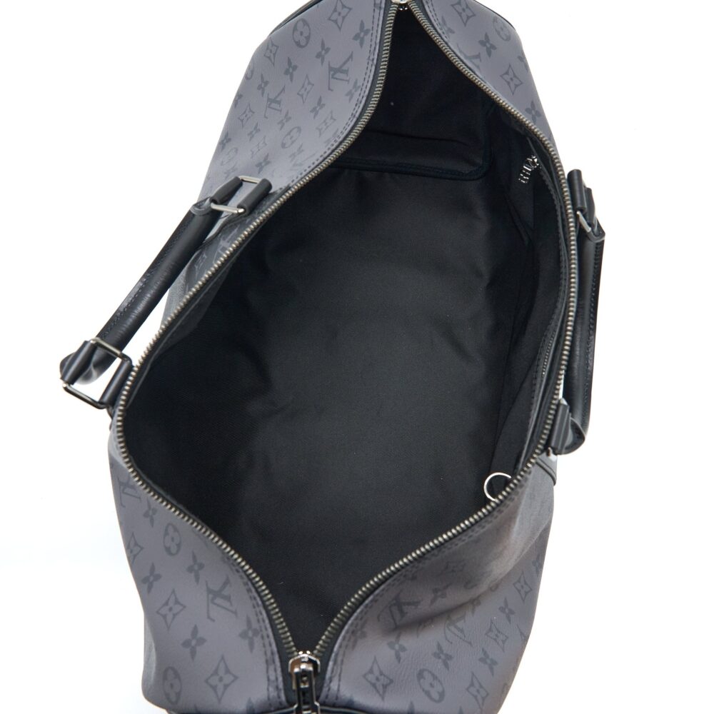 AAA Replica Louis Vuitton LV KEEPALL BANDOULIERE 50 MONOGRAM ECLIPSE CANVAS BLACK/GREY BLACK HARDWARE (NEW VERSION)